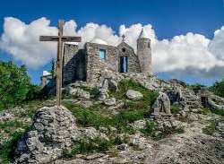 Mount Alvernia on Cat Island is about 63 meters in altitude and is the highest peak in the Bahamas Mount Alvernia on Cat Island is about 63 meters in altitude and is the highest peak in the Bahamas.